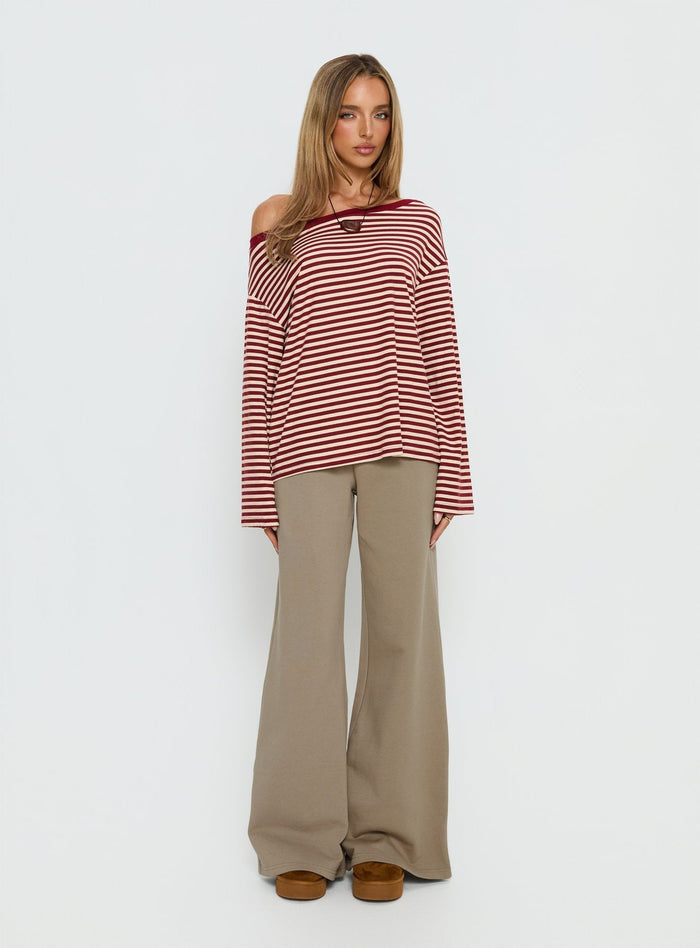 front view of model wearing Princess Polly Ralyssa Off Shoulder Long Sleeve Top Red Stripe Longline Jumpers Jumpers