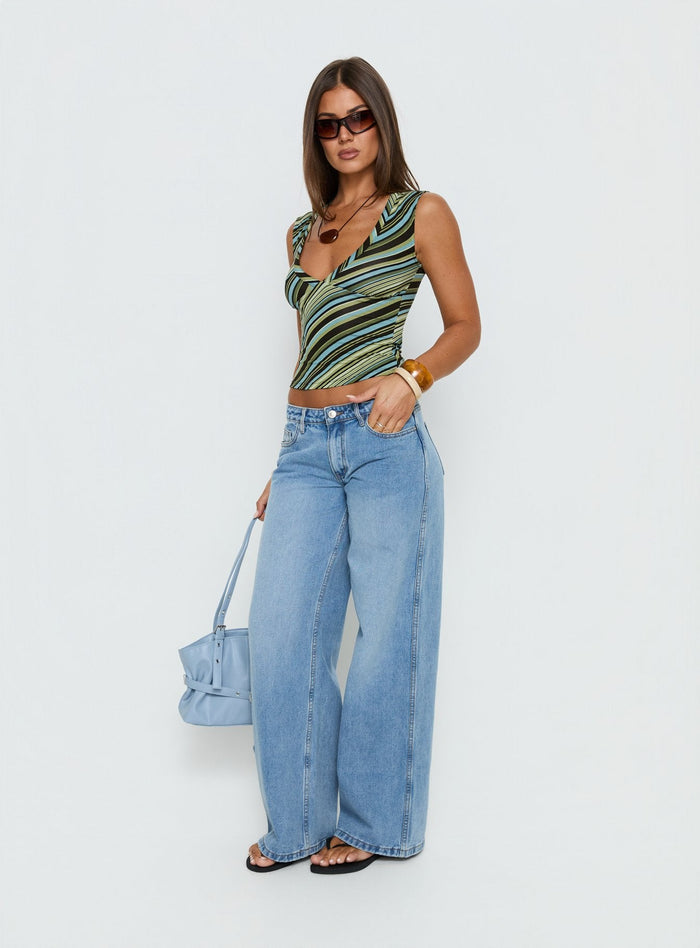 back view of model wearing Princess Polly Ramos Low Rise Wide Leg Denim Jeans Bright Blue Wash Mid Rise Jeans Jeans