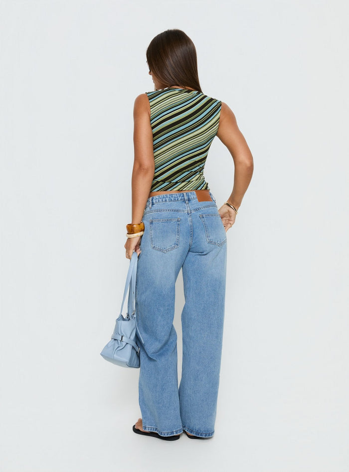 back view of model wearing Princess Polly Ramos Low Rise Wide Leg Denim Jeans Bright Blue Wash Mid Rise Jeans Jeans