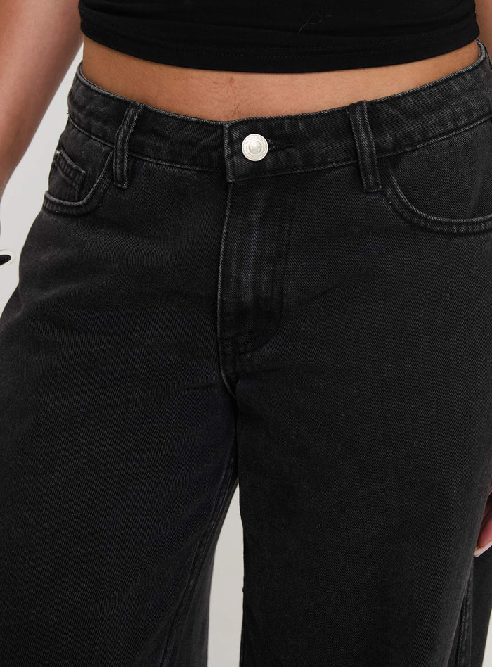 back view of model wearing Princess Polly Ramos Low Rise Denim Jeans Washed Black Mid Rise