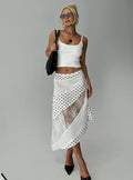 side view of model wearing Princess Polly Rennar Maxi Skirt White / Polka Dot Petite Midi Skirts