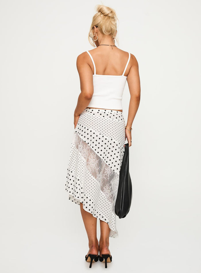 back view of model wearing Princess Polly Rennar Maxi Skirt White / Polka Dot Petite Midi Skirts