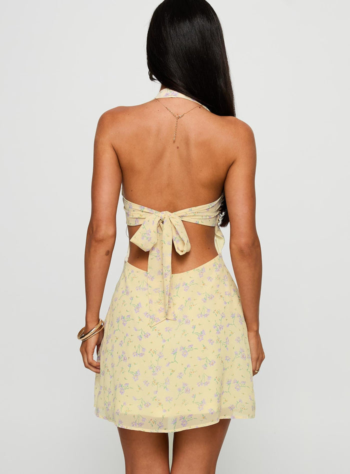 back view of model wearing Princess Polly Rosamie Halter Mini Dress Cream / Floral Square Neck