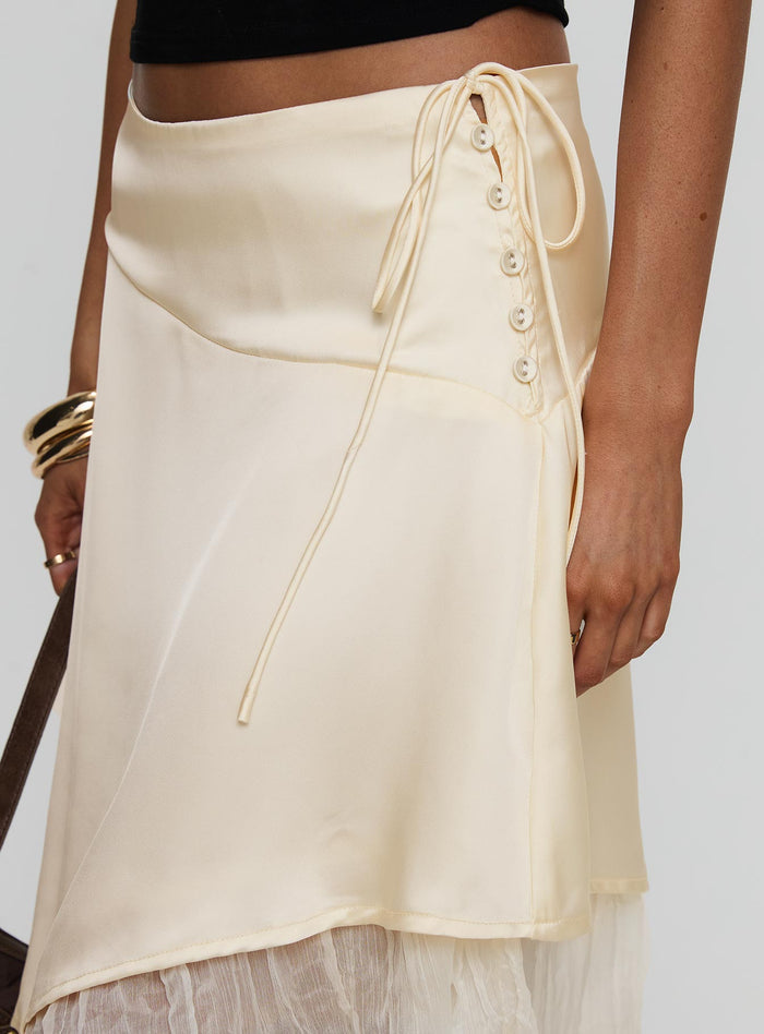 side view of model wearing Princess Polly Rosemead Satin Midi Skirt Cream Midi Skirts