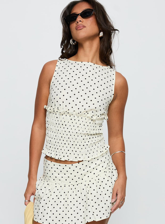 front view of model wearing Princess Polly Roxee Ruched Linen Blend Top Cream Polka Sleeveless Boat Neck