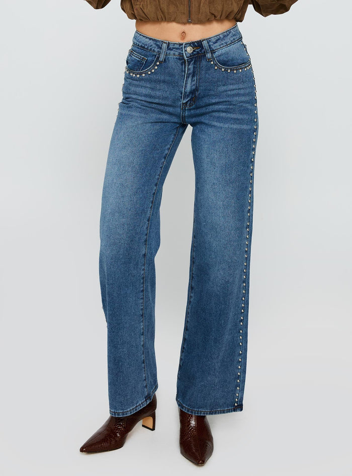 side view of model wearing Princess Polly Saving Up Stud Detail Jeans Mid Blue Mid Rise