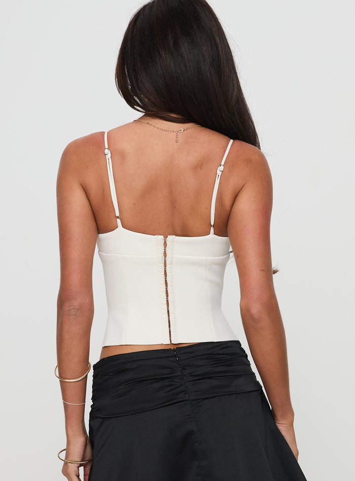 back view of model wearing Princess Polly Sculpture Top Cream Sleeveless Plunger