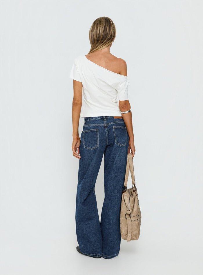back view of model wearing Princess Polly Serenitia Mid Rise Straight Leg Relaxed Jeans Dark Blue Wash Mid Rise Jeans