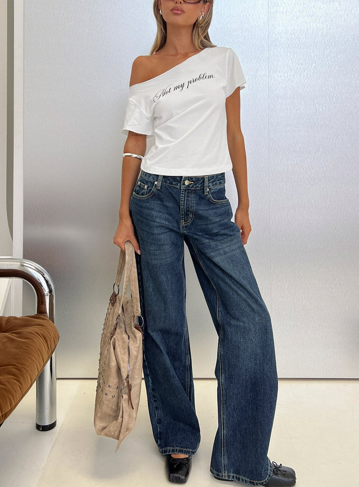 front view of model wearing Princess Polly Serenitia Mid Rise Straight Leg Relaxed Jeans Dark Blue Wash Mid Rise Jeans