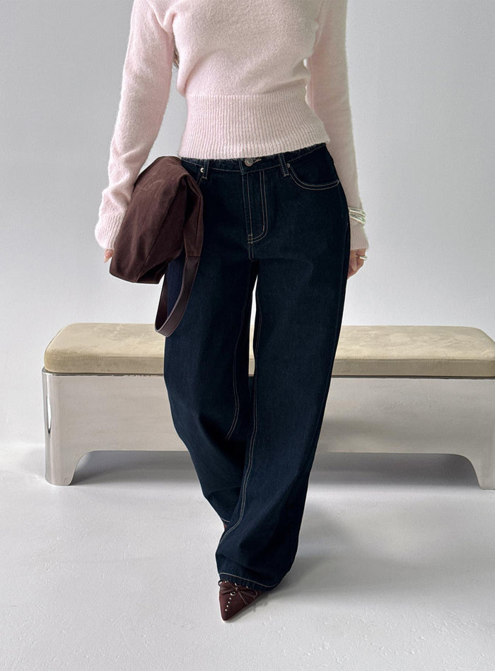 front view of model wearing Princess Polly Serenitia Mid Rise Relaxed Jeans Dark Raw Wash Mid Rise Jeans