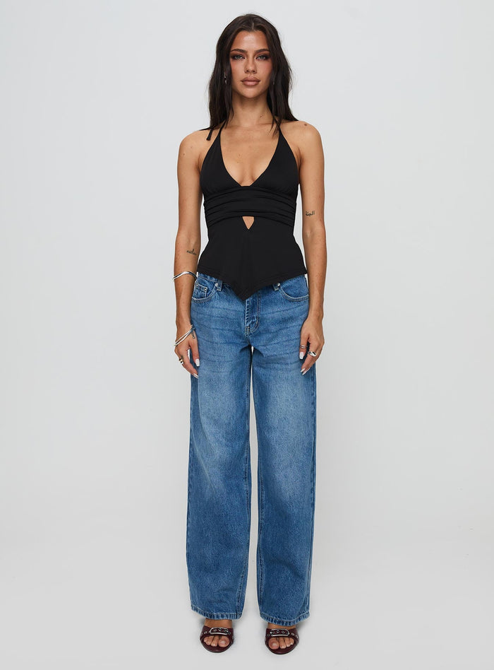 front view of model wearing Princess Polly Serenitia Mid Rise Relaxed Jeans Mid Blue Wash Mid Rise