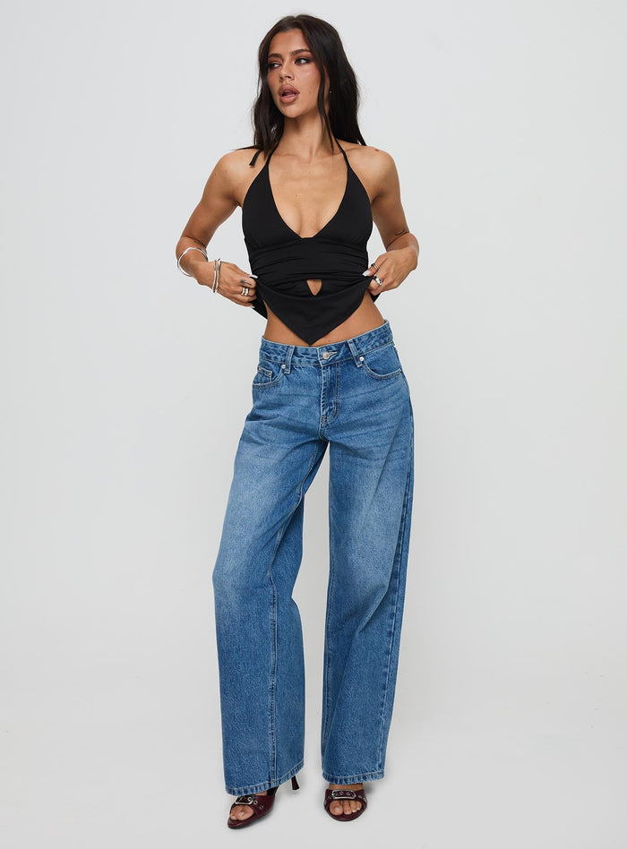 front view of model wearing Princess Polly Serenitia Mid Rise Relaxed Jeans Mid Blue Wash Mid Rise