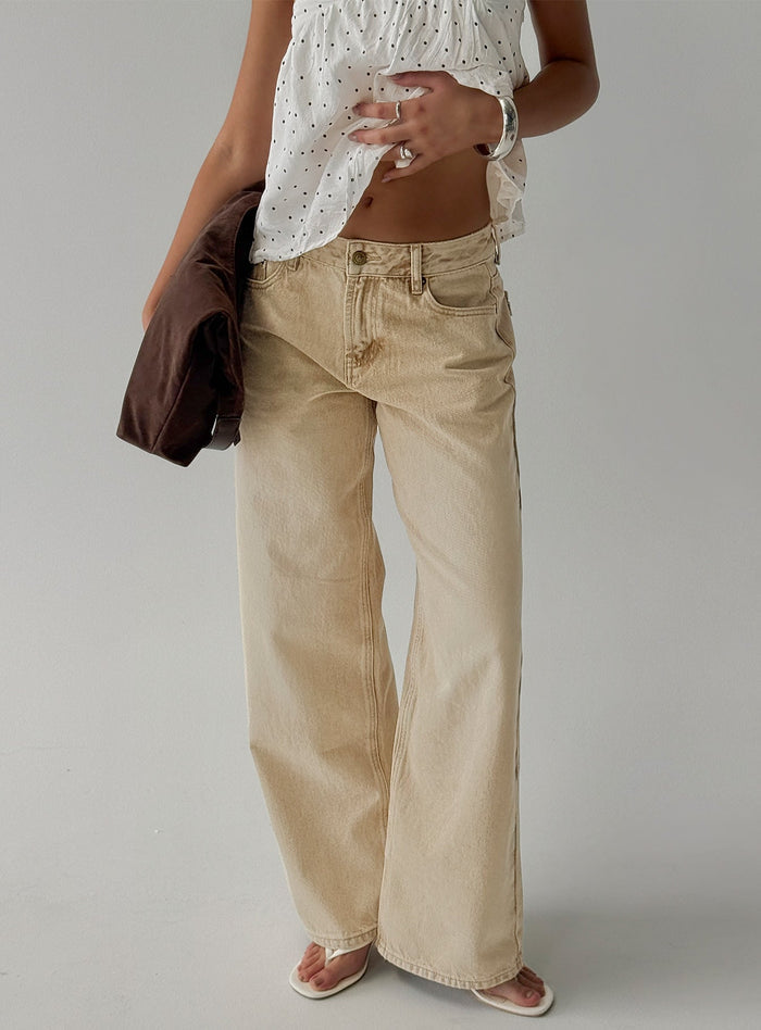 front view of model wearing Princess Polly Serenitia Mid Rise Relaxed Jeans Sandy Brown Wash Mid Rise Jeans