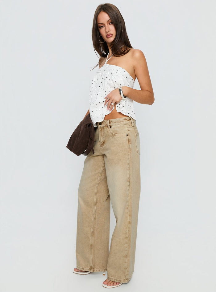 side view of model wearing Princess Polly Serenitia Mid Rise Relaxed Jeans Sandy Brown Wash Mid Rise Jeans