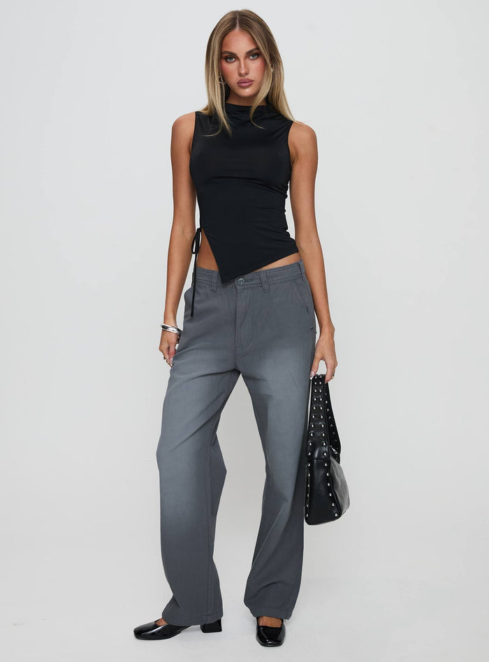 side view of model wearing Princess Polly Solarah Tie Side Top Black Sleeveless High Neck