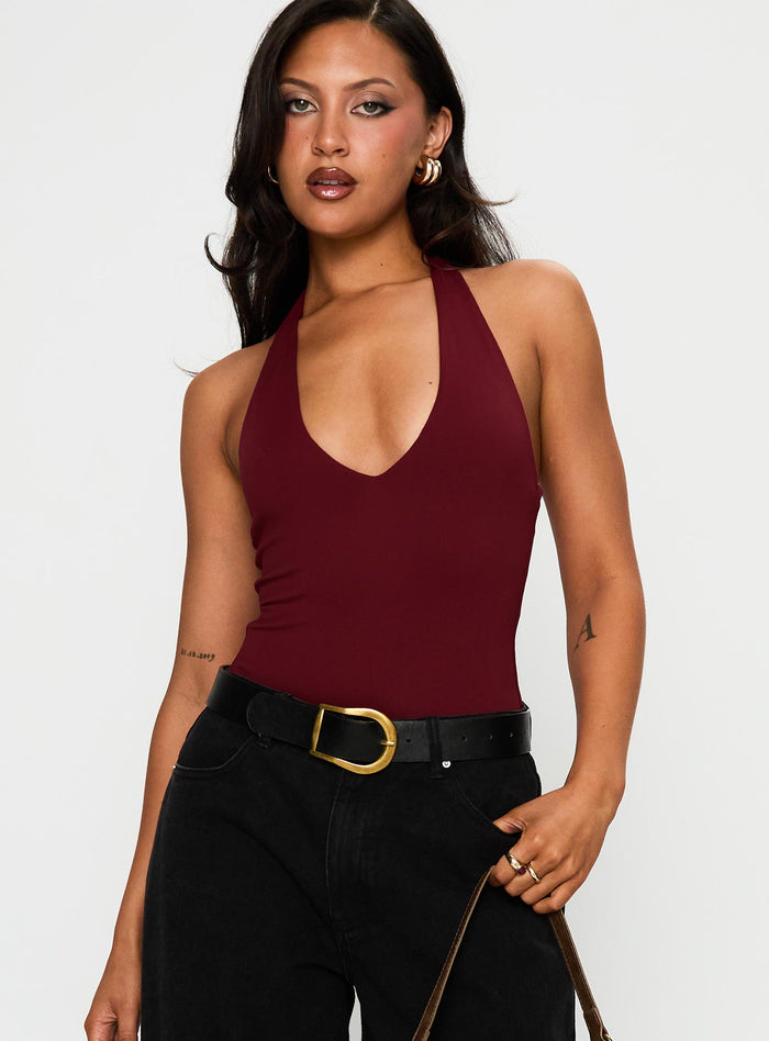 front view of model wearing Princess Polly Someone New Halter Bodysuit Burgundy Sleeveless