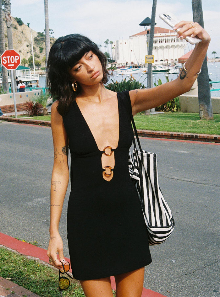 front view of model wearing Princess Polly Steward Halter Mini Dress Black Plunger