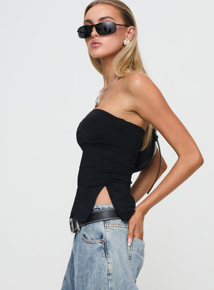 side view of model wearing Princess Polly Strutter Strapless Top Black Sleeveless straight