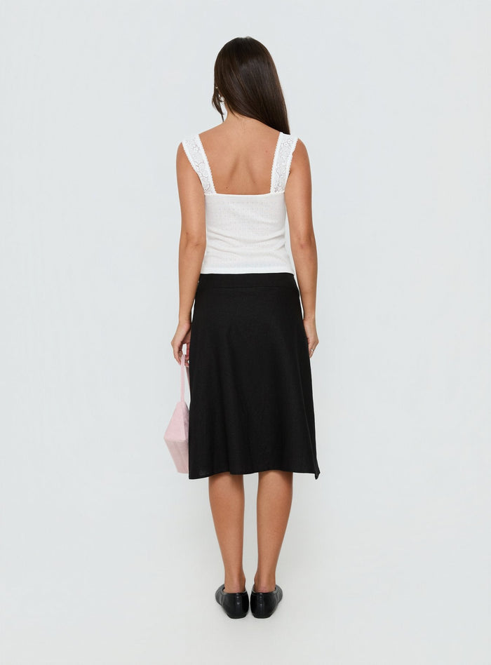 Displaying the Such Delight Linen Midi Skirt Black womens-skirts in relaxed aline fit back view of model wearing