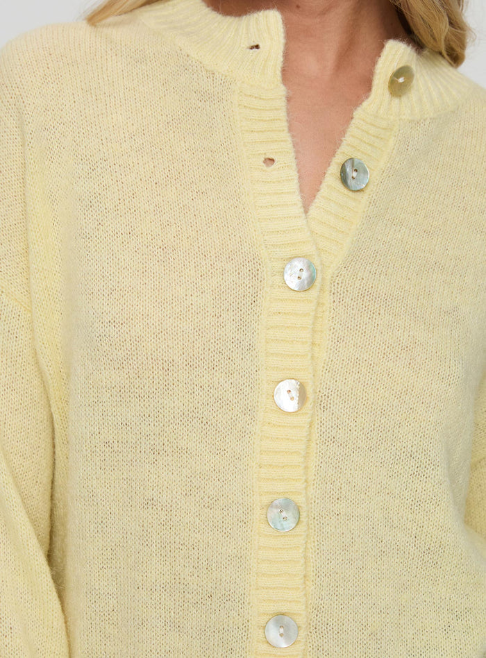 back view of model wearing Princess Polly Sunbeam Cardigan Yellow Long