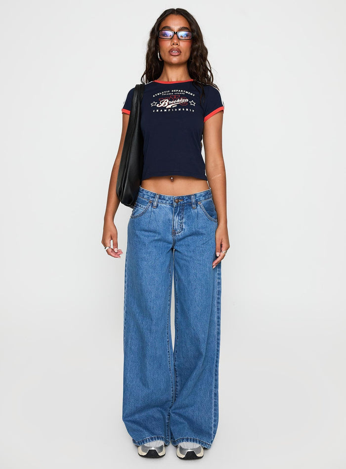 front view of model wearing Princess Polly Supercut Pleat Jean Mid Blue Low Rise Jeans
