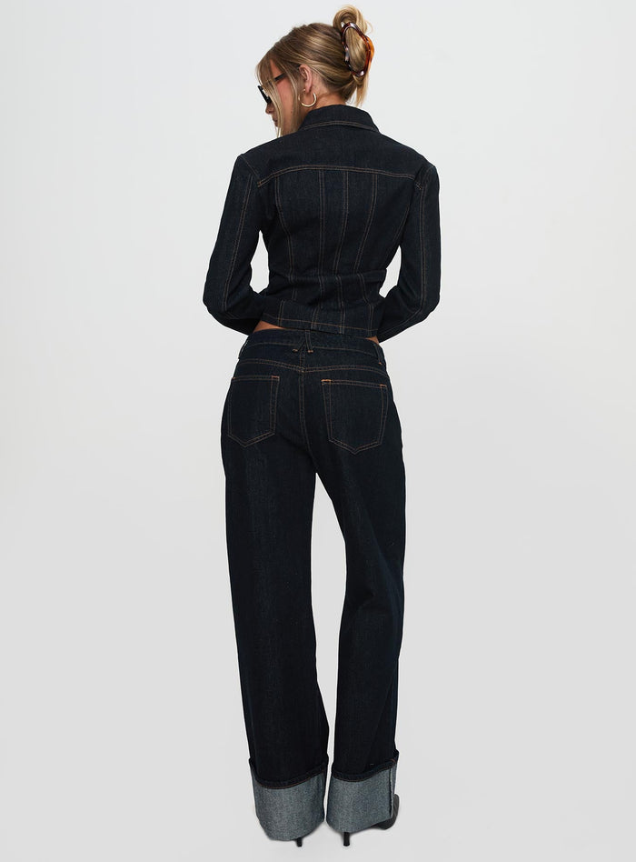 back view of model wearing Princess Polly Top Model Cuffed Jean Dark Denim Mid Rise