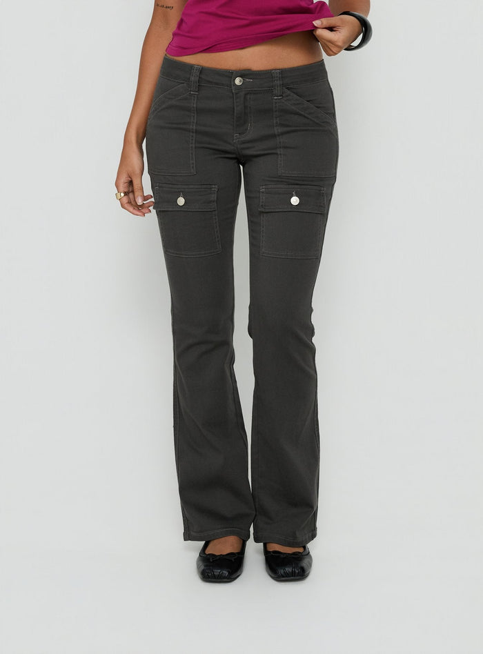 Crafted from charcoal fabric, the Trust Fund Low Rise Bootleg Cargo Pants in womens regular pants, front view of model wearing Princess Polly
