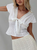 back view of model wearing Princess Polly Tullock Top White Low Impact Short Sleeves V-Neck