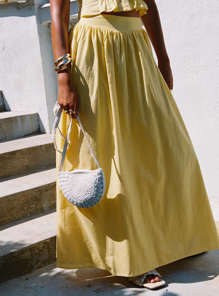 back view of model wearing Princess Polly Valerio Maxi Skirt Yellow Maxi