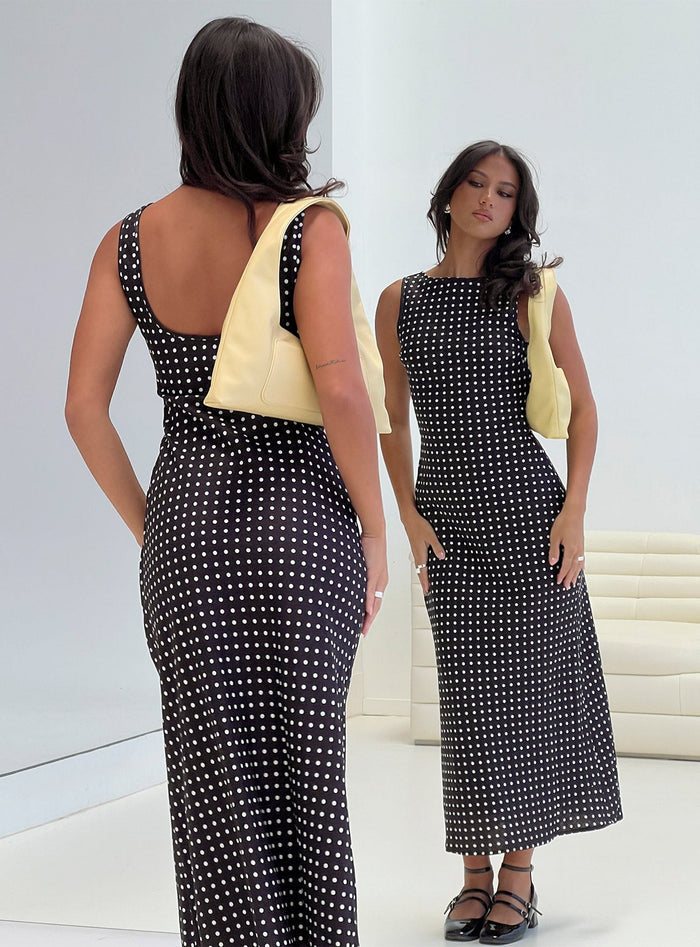 back view of model wearing Princess Polly Voyager Linen Blend Midi Dress Black Polka Crew Neck