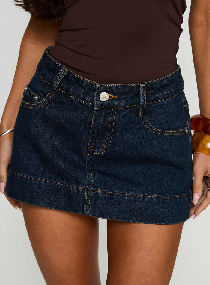 front view of model wearing Princess Polly Warna Low Rise Denim Mini Skirt Dark Wash Mini Skirts