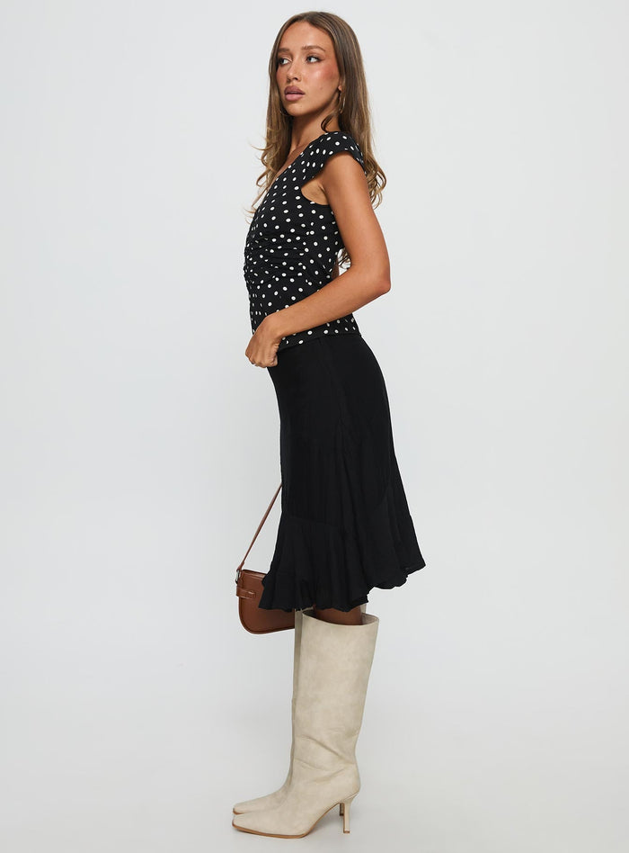 side view of model wearing Princess Polly With Kindness Midi Skirt Black