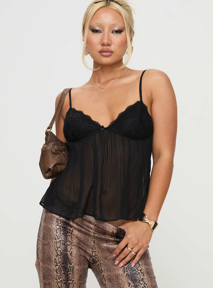side view of model wearing Princess Polly Zami Pleat Top Black Sleeveless V-Neck