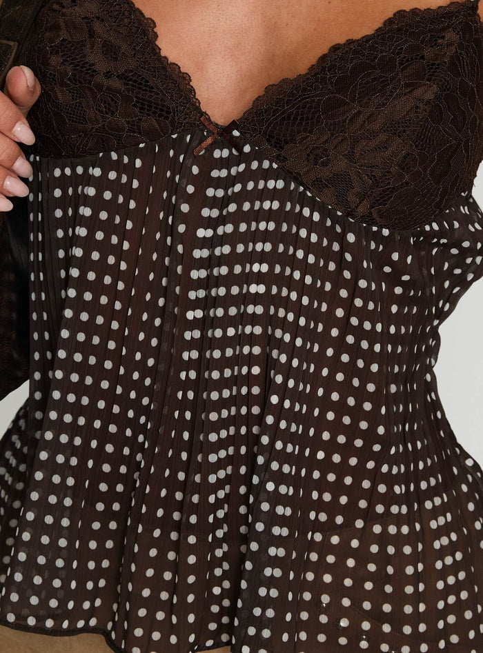 back view of model wearing Princess Polly Zami Pleat Top Brown Polka Sleeveless V-Neck