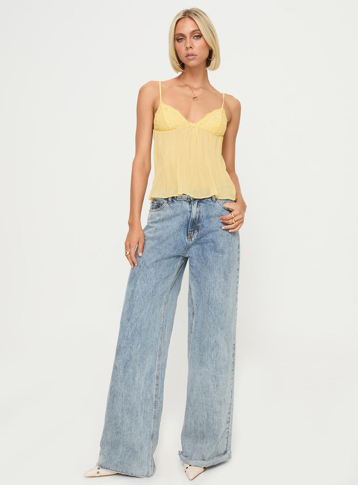 front view of model wearing Princess Polly Zami Pleat Top Lemon Sleeveless Plunger