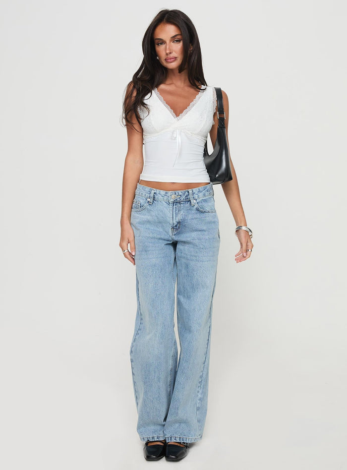 front view of model wearing Princess Polly Zyair Top White Sleeveless Plunger